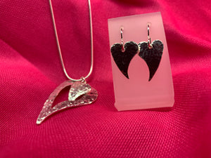 Cut-Out Silver Melting Hearts Pendant