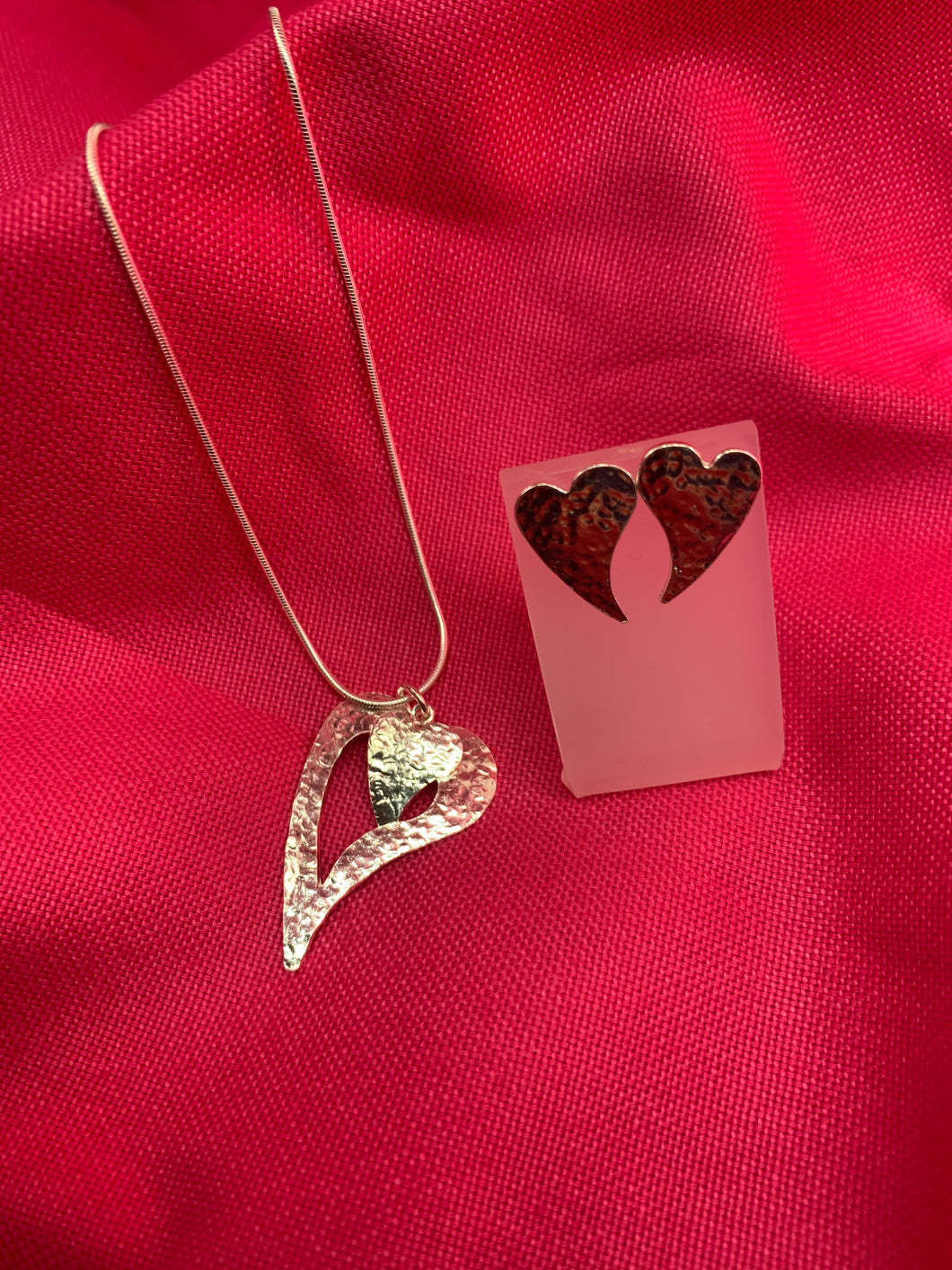 Cut-Out Silver Melting Hearts Pendant