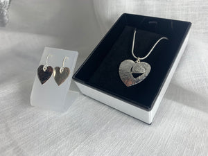Cut-Out Silver Hearts Pendant